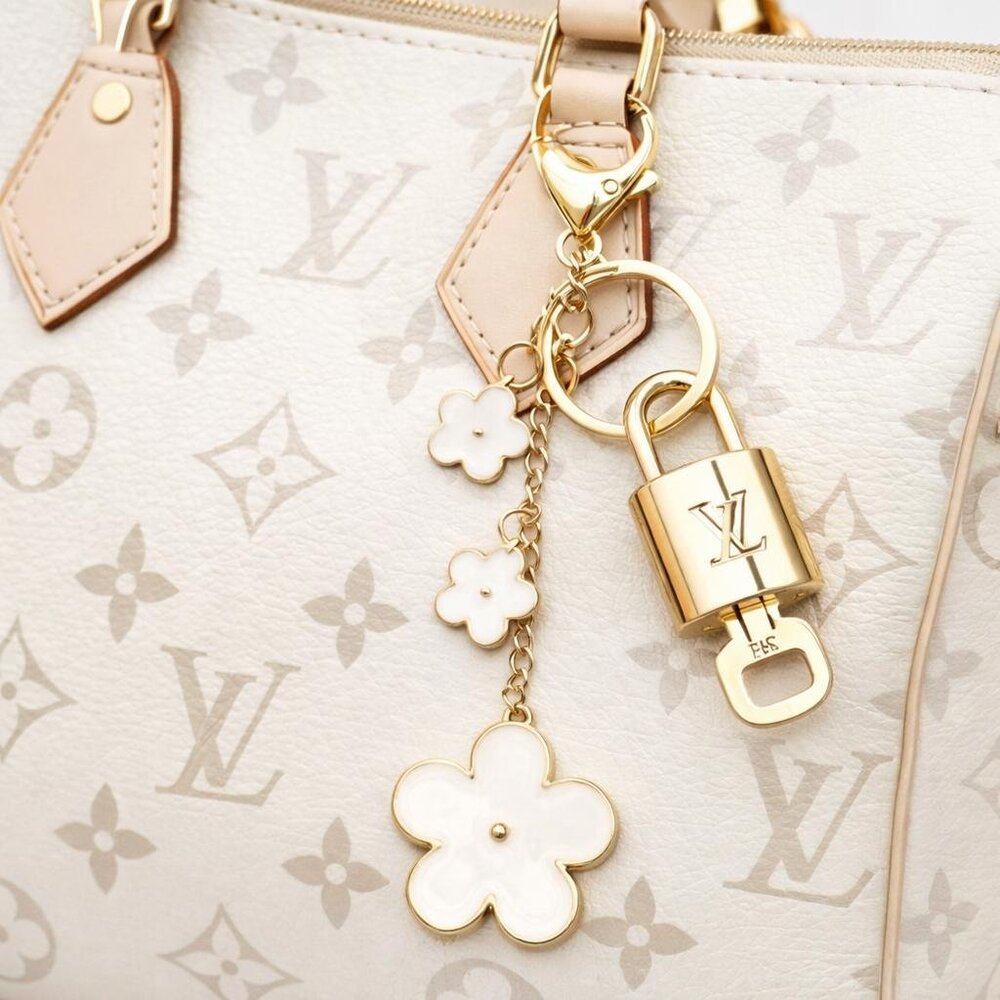 Louis Vuitton Authentic Gold Lock & Key 🔑 Bag Charm + Unbranded Flower Keychain